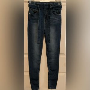 Size 7 Almost Famous super high rise skinny jeans with denim belt.